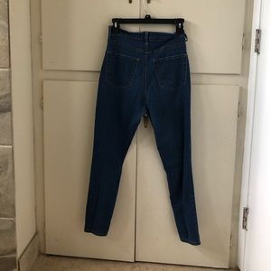 A pair of high waisted jeans